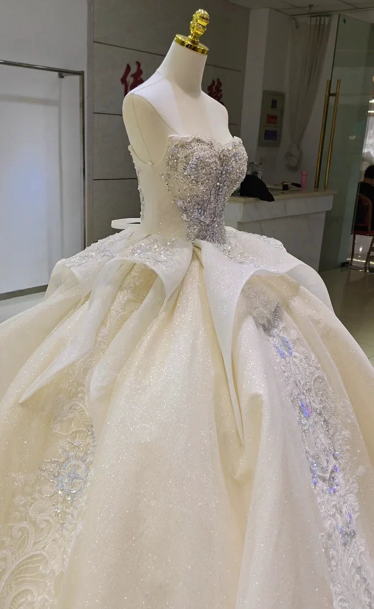 Ivory Glimmer Strapless Ballgown: Iridescent Beaded Bust & Flowing Train