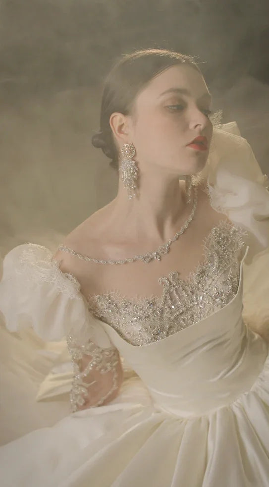 Regal Ball Gown Illusion Neckline Tulle Puff Sleeve Beaded Lace Wedding Dress with Oversized Bow Train E-304