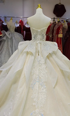 Ivory Glimmer Strapless Ballgown: Iridescent Beaded Bust & Flowing Train