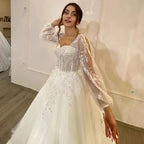 White Wedding Dresses Sweetheart Shiny Appliques Grace Bridal Gowns 2023 Puff Sleeve Tulle A-Line Princess