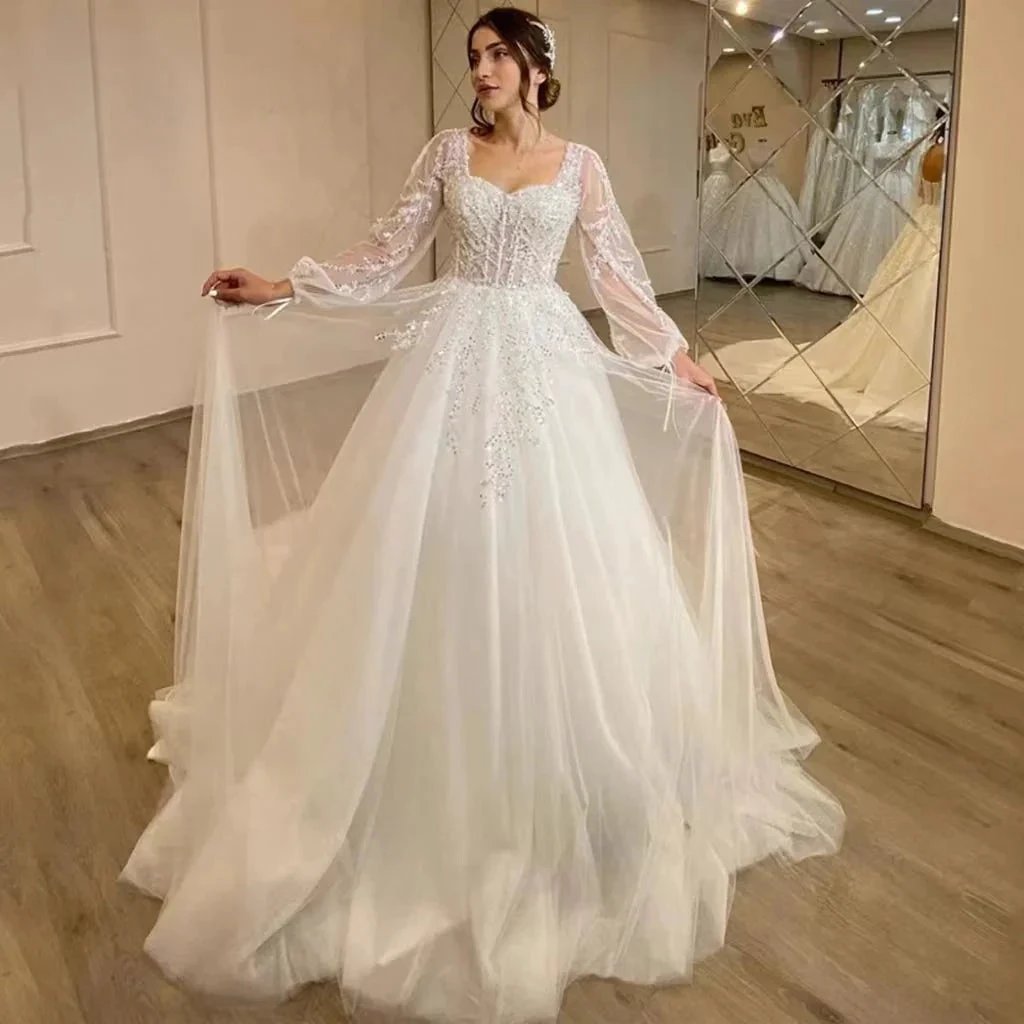 White Wedding Dresses Sweetheart Shiny Appliques Grace Bridal Gowns 2023 Puff Sleeve Tulle A-Line Princess