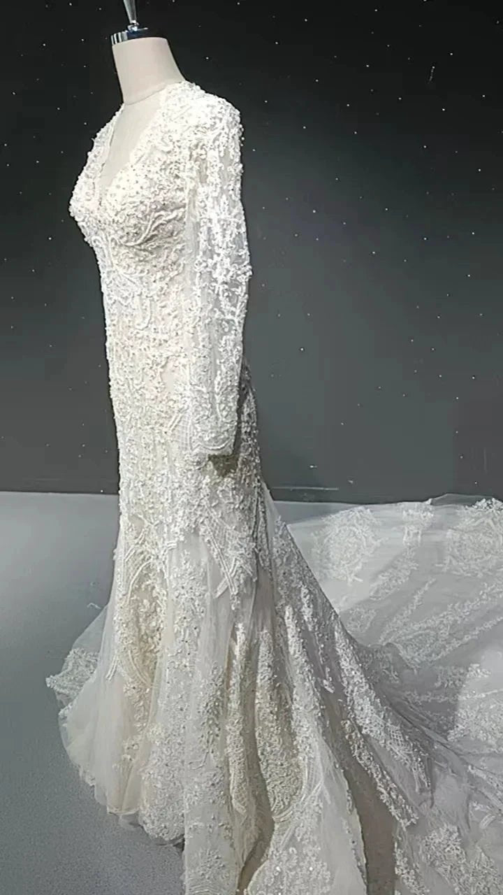 V-neck long sleeved luxurious nail bead trailing bridal veil