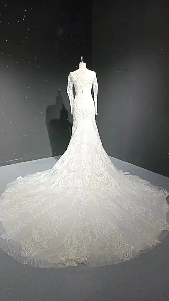 V-neck long sleeved luxurious nail bead trailing bridal veil