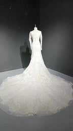 V-neck long sleeved luxurious nail bead trailing bridal veil