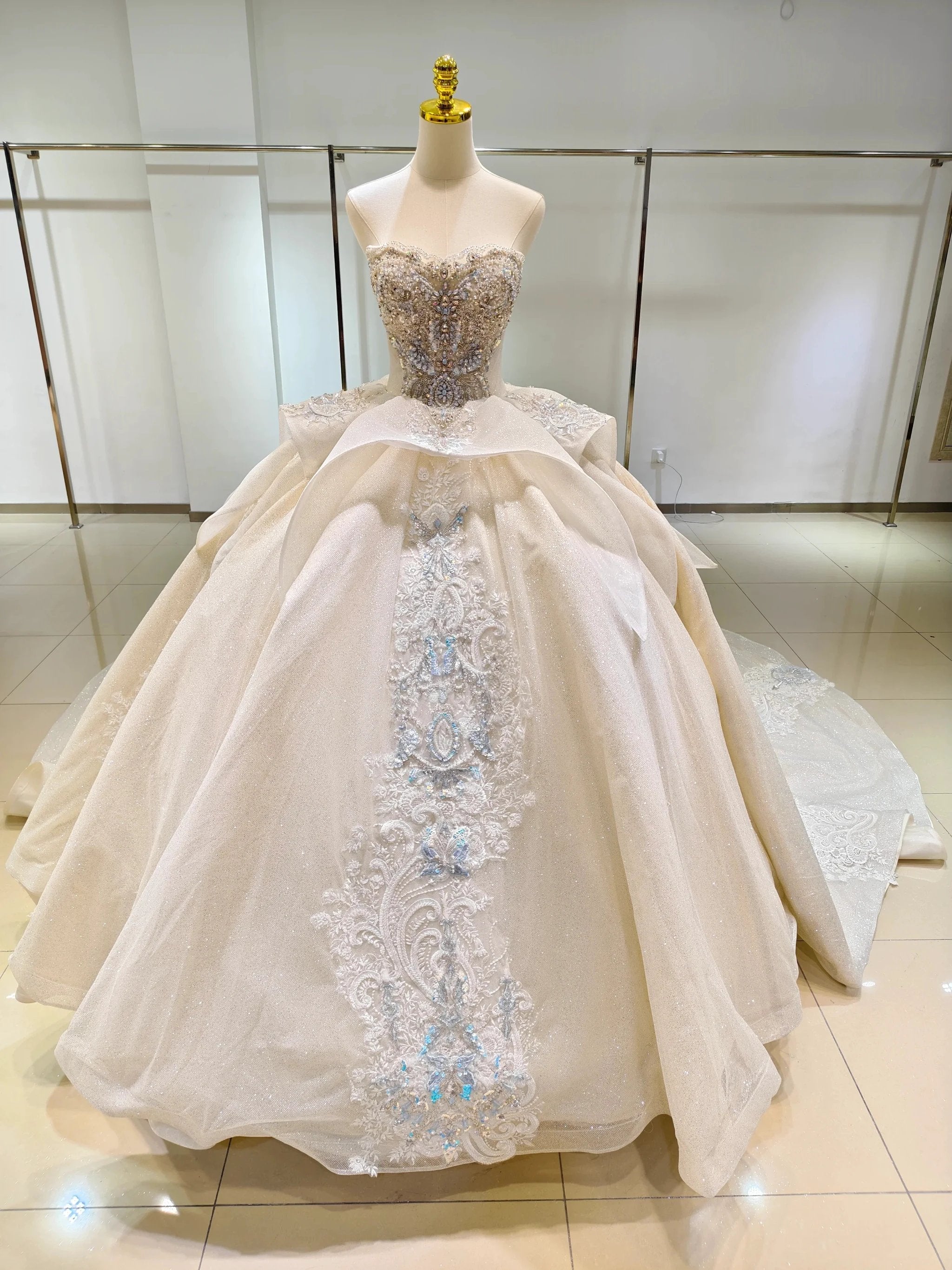 Ivory Glimmer Strapless Ballgown: Iridescent Beaded Bust & Flowing Train