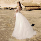 Beach Ivory Lace Wedding Dresses Illusion Long Sleeves Bridal Gowns Jewel Neck Backless Appliqued Tulle A-Line Floor Length