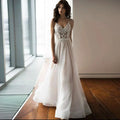 Charming Spaghetti Straps V Neck Wedding Dresses Lace Appliques Backless Tulle A Line Bridal Gowns Sweep Train Robe