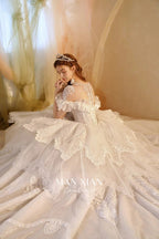 Luminous Ivory Sweetheart Glitter Tulle Ball Gown with Ruffled Sleeves, Pearl Embroidery & Lace Train M013