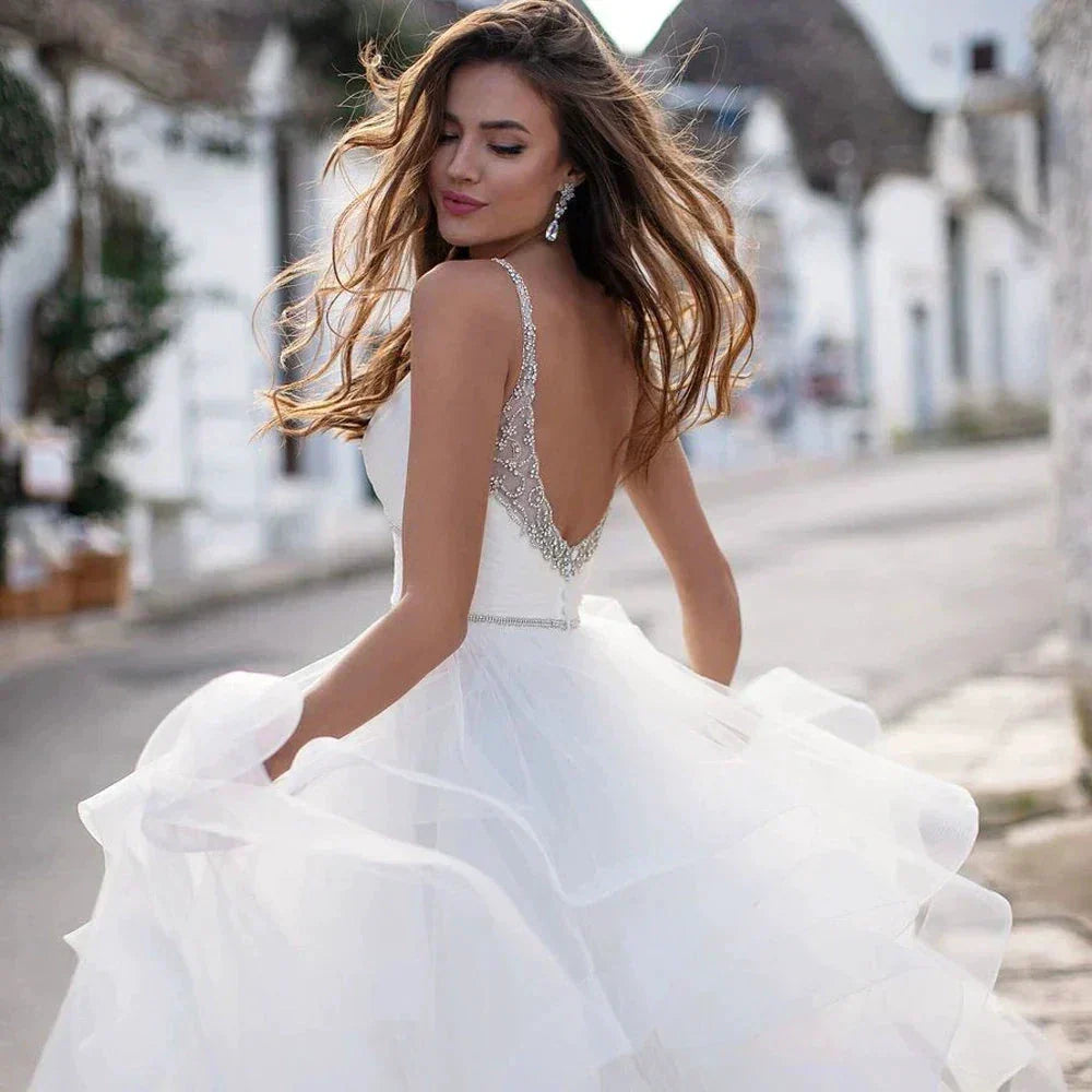 Elegant Spaghetti Straps Ball Gown Wedding Dresses Backless Robe de Mariage Delicate Beaded Ruffles Bridal Gown