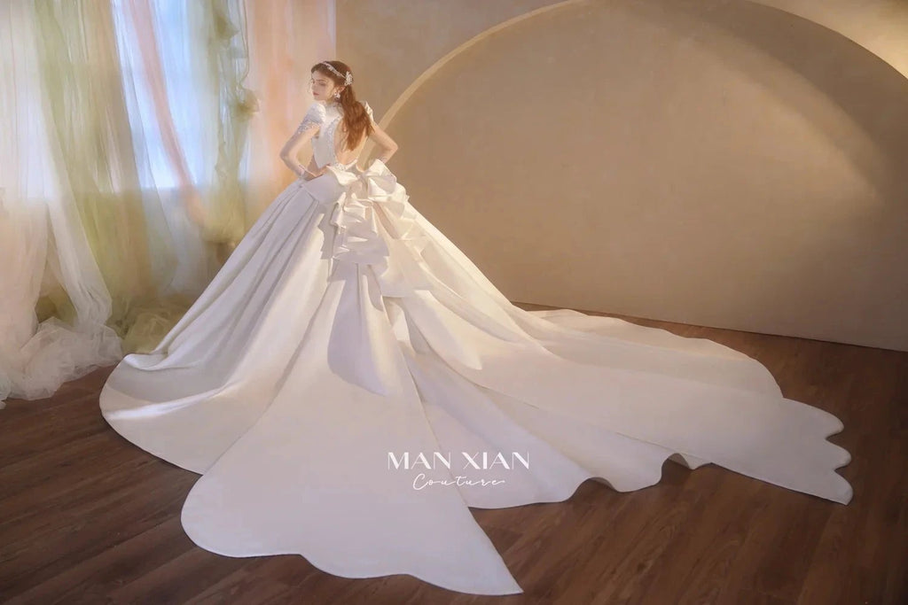 Opulent Ivory V-Neck Satin Ball Gown with Crystal Embroidery, Sheer Sleeves & Keyhole Back Bow A001