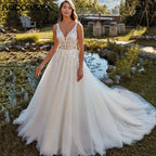 Beach Wedding Dresses Appliques Straps V-Neck Bridal Party Gowns Backless Sweep Train robe de mariée fluide Custom Made