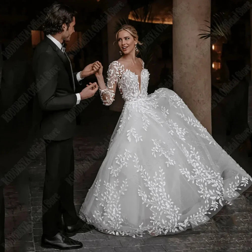 Sexy Backless Wedding Dresses New 2023 Long Sleeves Bride Gowns V-Neck A-Line Lace Applique Tulle vestidos de novia