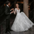Sexy Backless Wedding Dresses New 2023 Long Sleeves Bride Gowns V-Neck A-Line Lace Applique Tulle vestidos de novia