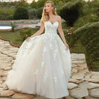 Beach Ivory Wedding Dresses for Women 2023 Summer Sweetheart A-Line Floor Length Illusion Bride Dress Bow Back Lace Applique