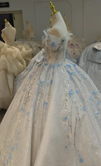 Ethereal Off-the-Shoulder Ball Gown Wedding Dress with Sequin Tulle, 3D Pastel Florals & Feather Accents Ye-2028
