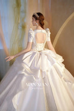 Regal Ivory Square-Neck Satin Ball Gown with Puff Sleeves, Pearl Embroidery & Oversized Bow Train m011