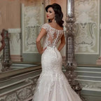 Luxury Mermaid Wedding Dress Short Sleeves Lace Appliques Elegant Boat Neck Bride Gown Illusion Backless Button Train