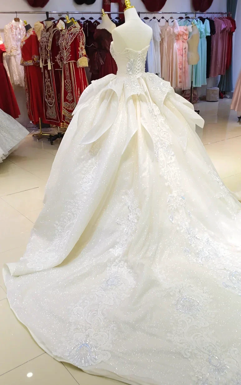 Ivory Glimmer Strapless Ballgown: Iridescent Beaded Bust & Flowing Train