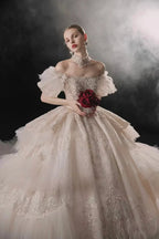 Opulent Off-the-Shoulder Ball Gown Tulle Puff Sleeve Beaded Lace Wedding Dress with Layered Ruffled Train & Choker Q6001