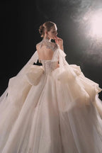 Opulent High-Neck Ball Gown Beaded Mesh Capelet Ruffled Skirt Wedding Dress with Sparkling Train Q6009