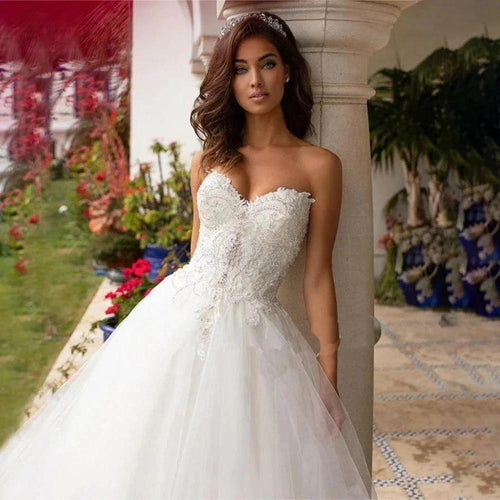 Backless Princess Sequined Beading Bodice Luxury Bridal Gown Sweetheart Lace Appliques Puffy Organza Wedding Dress Robe de Marie