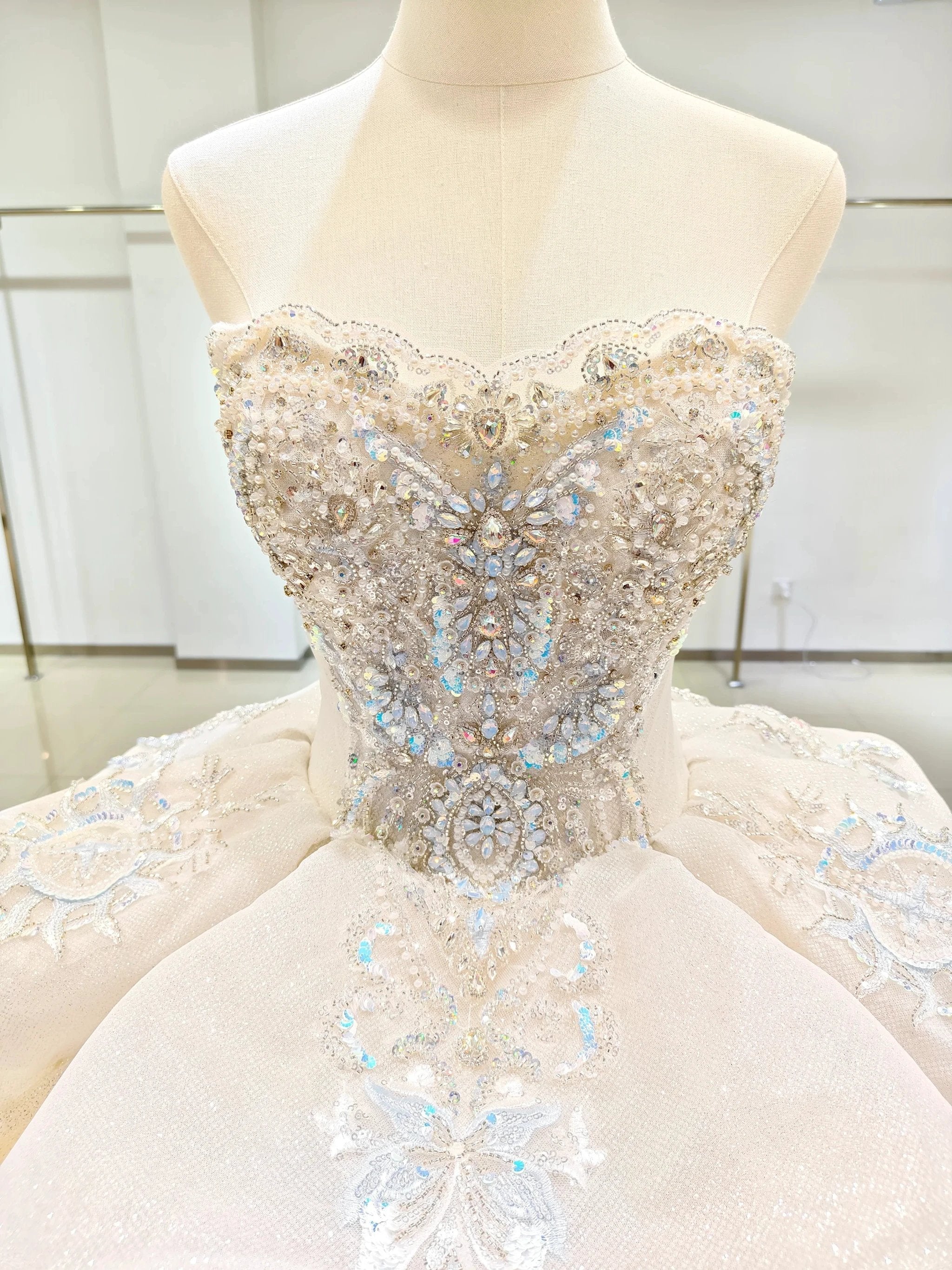 Ivory Glimmer Strapless Ballgown: Iridescent Beaded Bust & Flowing Train