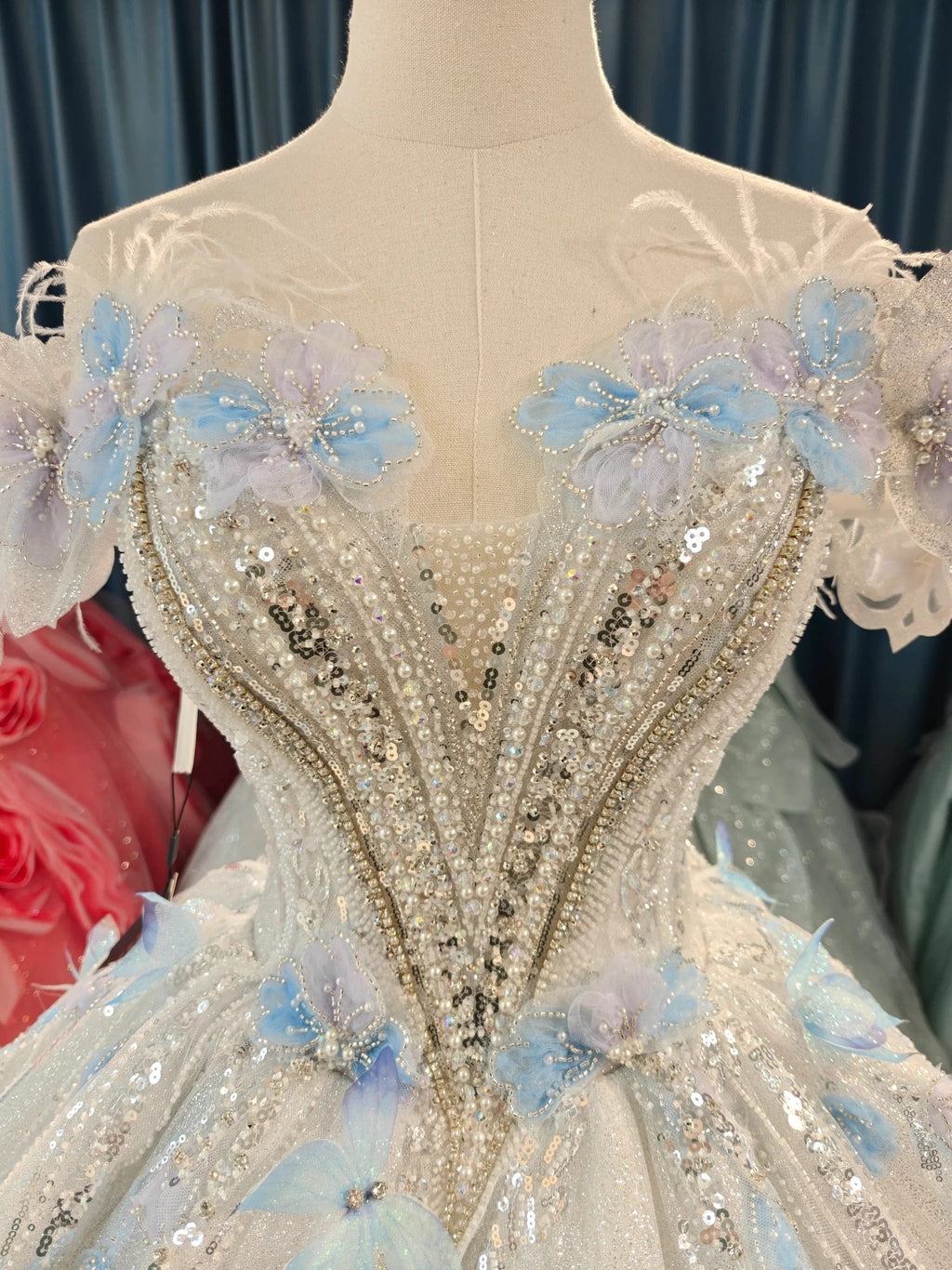 Ethereal Off-the-Shoulder Ball Gown Wedding Dress with Sequin Tulle, 3D Pastel Florals & Feather Accents Ye-2028