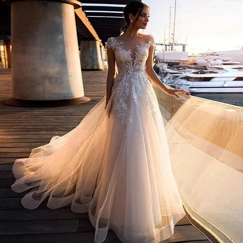 Boho Beach Wedding Dress O-Neck Appliques Lace Top Vintage Princess Wedding Gown Cap Sleeve Simple Bride Dress 2020
