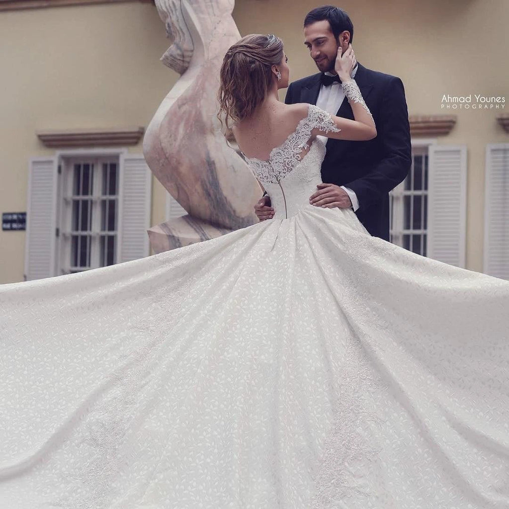 Elegant Long A-Line Off-the-Shoulder Backless Appliques Lace Wedding Dress with Sleeves