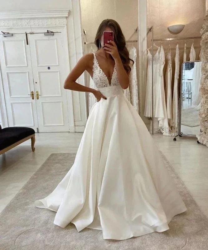 Elegant Sleeveless Tulle Backless A-Line Wedding Dresses With Lace
