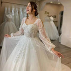 White Wedding Dresses Sweetheart Shiny Appliques Grace Bridal Gowns 2023 Puff Sleeve Tulle A-Line Princess