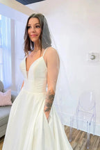 Glamorous Long A-Line Sweetheart Satin Backless Wedding Dress With Pockets