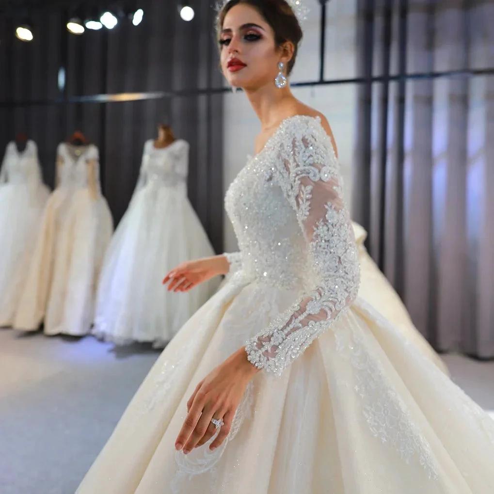 Long A-Line Sweetheart Backless Appliques Lace Sequins Wedding Dress with Sleeves